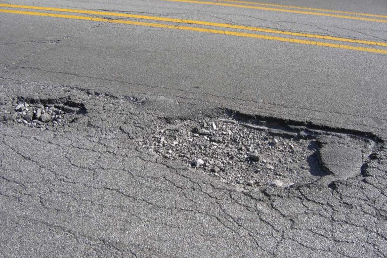 Mechanical Concrete Pothole Terminator promises tyre based pothole repairs