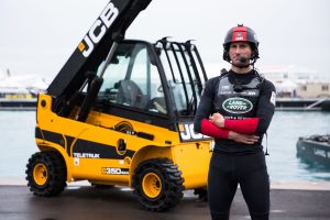 Sir Ben Ainslie with a JCB Teletruk which has been helping his team as they bid for America's Cup glory