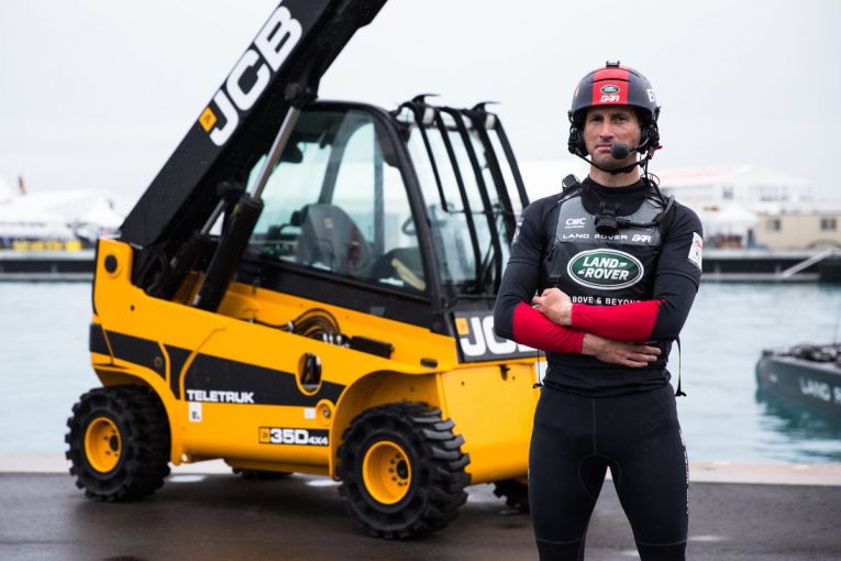 Britain's bid for the America's Cup is powered, lit and given a lift up by JCB