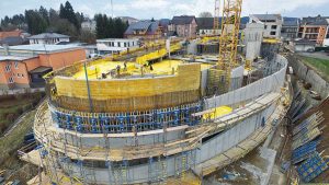 The elliptical shape of the building is formed with Large-area formwork Top 50 carrying Formwork sheet 3-SO as form-ply.