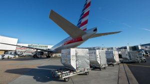 Heathrow, Terminal 3, Pier 5, cargo being unloaded from American Airlines Boeing 777-323(ER) aircraft, November 2016.