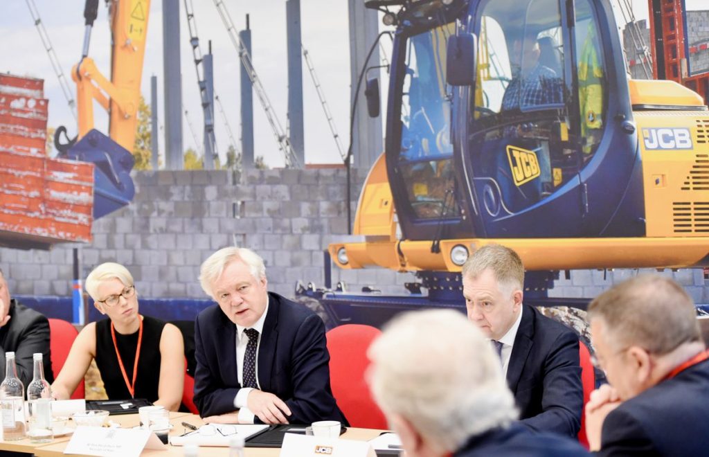 David Davis visits JCB to reassure British business as Brexit talks enter key stage