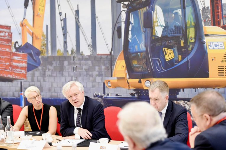 David Davis visits JCB to reassure British business as Brexit talks enter key stage