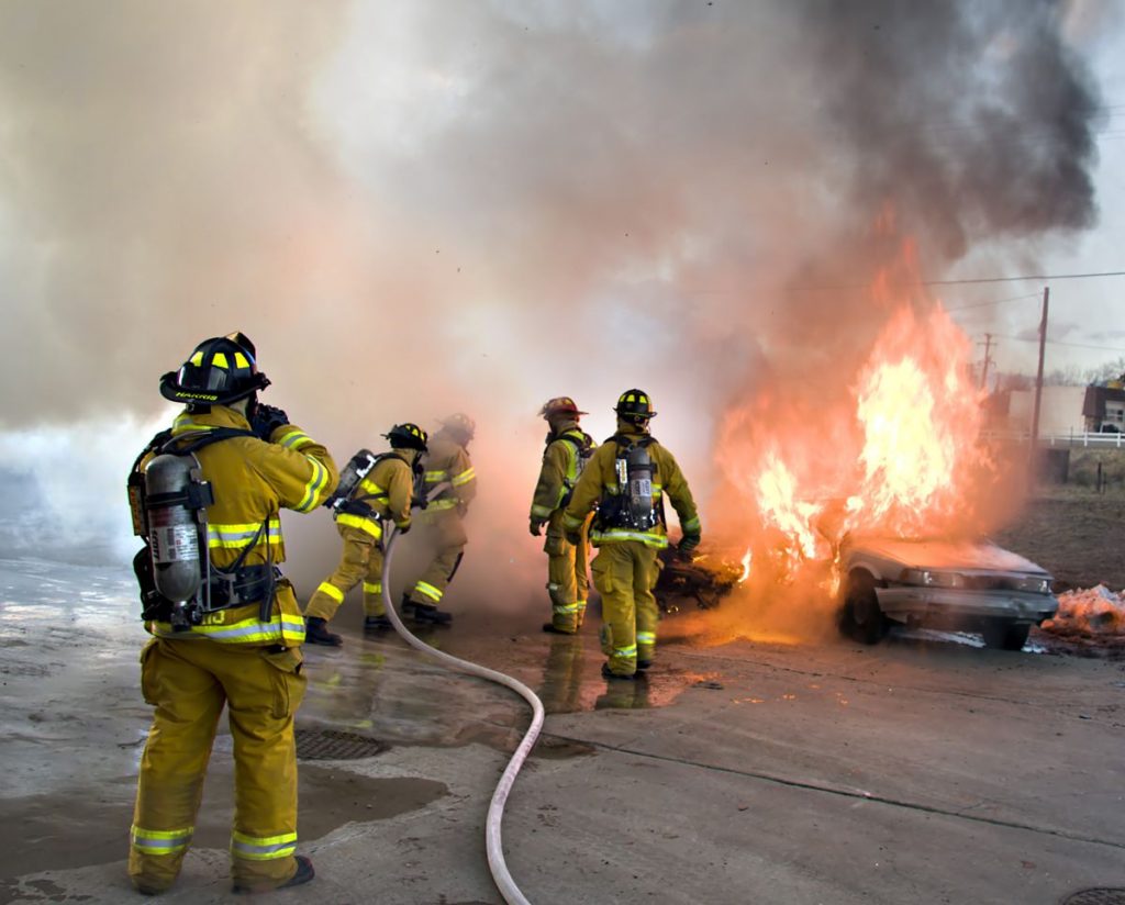 Firefighters tackling car fire - Photo by Andrew Magill