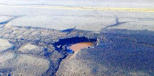 Pothole - Photo by Mike Mozart