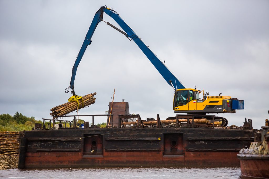 The modified Volvo EC250 crawler excavator with grapple attachment.