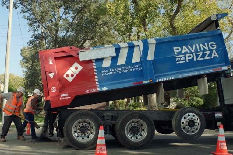 Domino's is so fed up with Potholes, they've started repairing them - Paving for Pizza