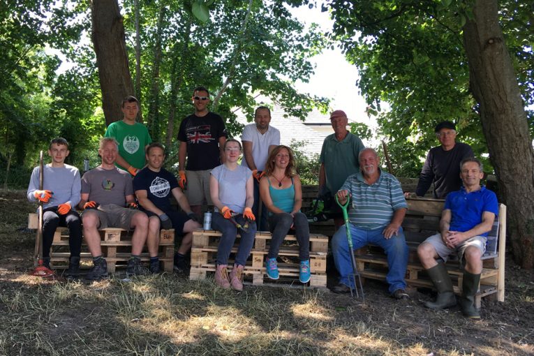 Highways England volunteers pitch in to help Cornwall villagers with recreation ground project