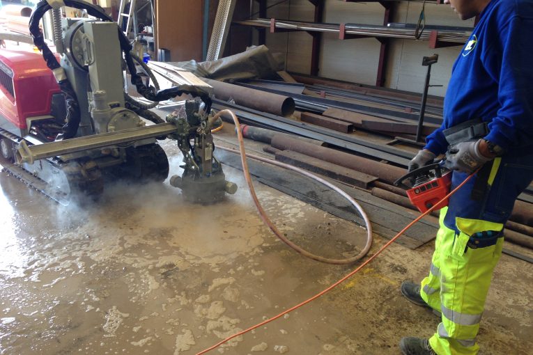 Concrete roughed up by Aquajet Systems Rotolance Hydrodemolition attachments
