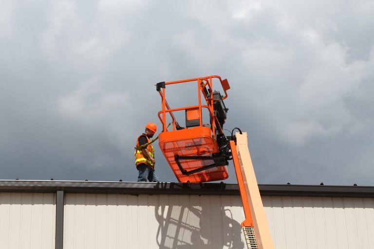JLG external bolt-on fall arrest system allows operators to work outside the platform
