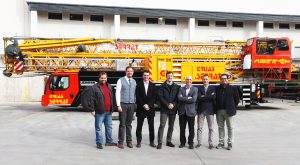 Josep Vega (3rd from right), owner of the Spanish crane company Grùas Serrat, takes delivery of the first MK 88 in Spain. Pictured from left to right: Pedro Invernon (Grúas Cerezo), Daniel Nötzel (Liebherr), Roberto Insausti (Liebherr), Gabriel Iturralde (Liebherr), Josep Vega (Grúas Serrat), Javier Verano (Liebherr), Miguel Cerezo (Grúas Cerezo).