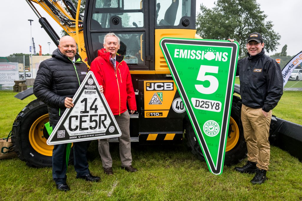Pictured LtR Kevin Howells Datatag MD, Rob Oliver CEO CEA, and Charles Stevenson General Manager JCB launching the prototype ECV system at Plantworx 2019