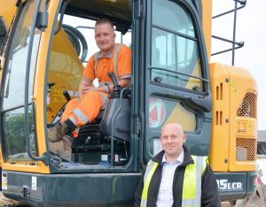 True Plant Hire’s operator Jack Asher and MD, Tom Macfarlane with the new Hyundai HX235LCR