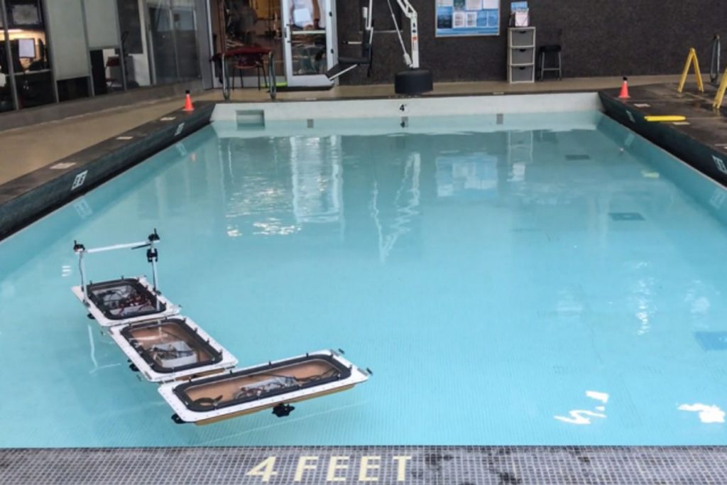 MIT’s fleet of robotic boats has been updated with new capabilities to “shapeshift,” by autonomously disconnecting and reassembling into different configurations to form various floating platforms in the canals of Amsterdam. In experiments in a pool, the boats rearranged themselves from a connected straight line into an “L” (shown here) and other shapes. Images and gifs: courtesy of the researchers