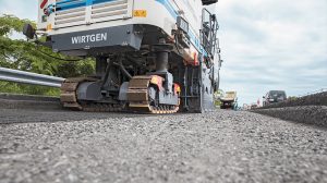 Cold milling machines like Wirtgen’s W 210i, with their ability to selectively mill the surface, binder, and base layers as well as their intelligent milling technologies, help ensure that the RAP can be recycled particularly cost-effectively in the asphalt mixing plant.