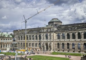 The Liebherr mobile construction crane MK 88 Plus in operation against the picturesque backdrop of the Dresden Zwinger.
