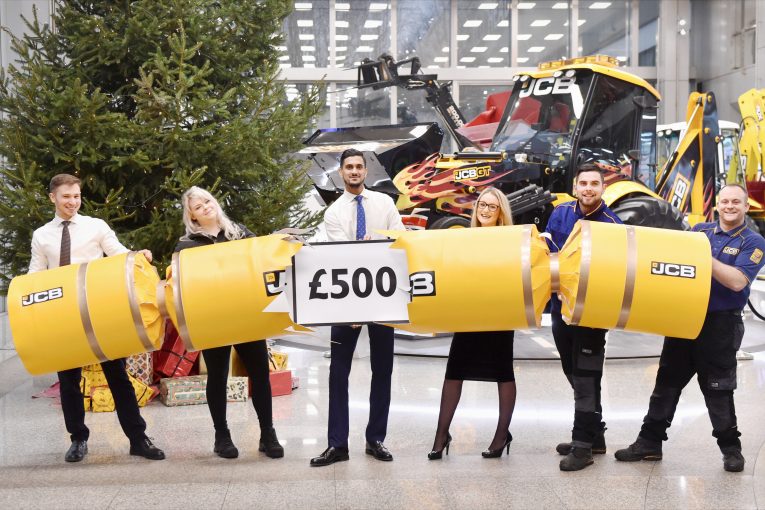 JCB announces generous festive bonuses and pay rises for UK workforce