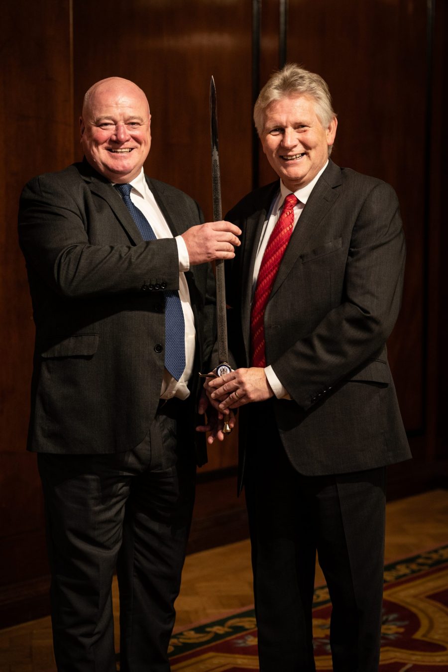 Mike O’Neill receiving the Sword of Honour from Mike Robinson, Chief Executive of the British Safety Council.