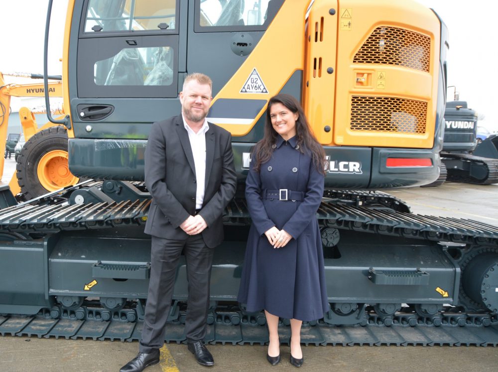 Tony Reeves Hyundai UK and Ireland Sales Manager and Rachel Hamilton Business Development Executive Datatag - with the first machines fitted with Datatag CESAR marking at Tilbury Port, Essex.