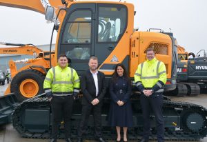 Jack Couch Shipping Agent MK Shipping, Tony Reeves Hyundai UK and Ireland Sales Manager, Rachel Hamilton Business Development Executive Datatag and Rhys Hymas Operations Manager MK Shipping - with the first machines fitted with Datatag CESAR marking at Tilbury Port, Essex.