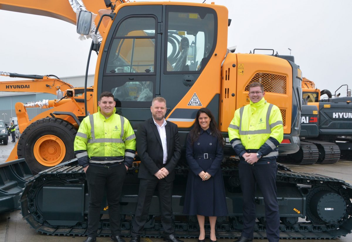 Jack Couch Shipping Agent MK Shipping, Tony Reeves Hyundai UK and Ireland Sales Manager, Rachel Hamilton Business Development Executive Datatag and Rhys Hymas Operations Manager MK Shipping - with the first machines fitted with Datatag CESAR marking at Tilbury Port, Essex.