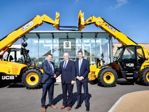 Pictured left to right is Gunn JCB Sales Director Mark Roberts, Ridgeway Rentals Owner Tim Jones and JCB Sales Director Steve Smith outside JCB Golf Academy, Rocester