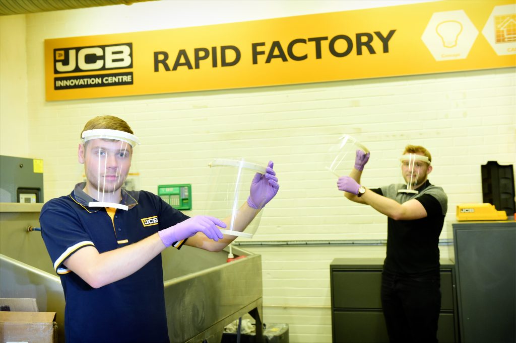 Pictured left to right is JCB Employee Joe Mumby and Joe Bagley with masks