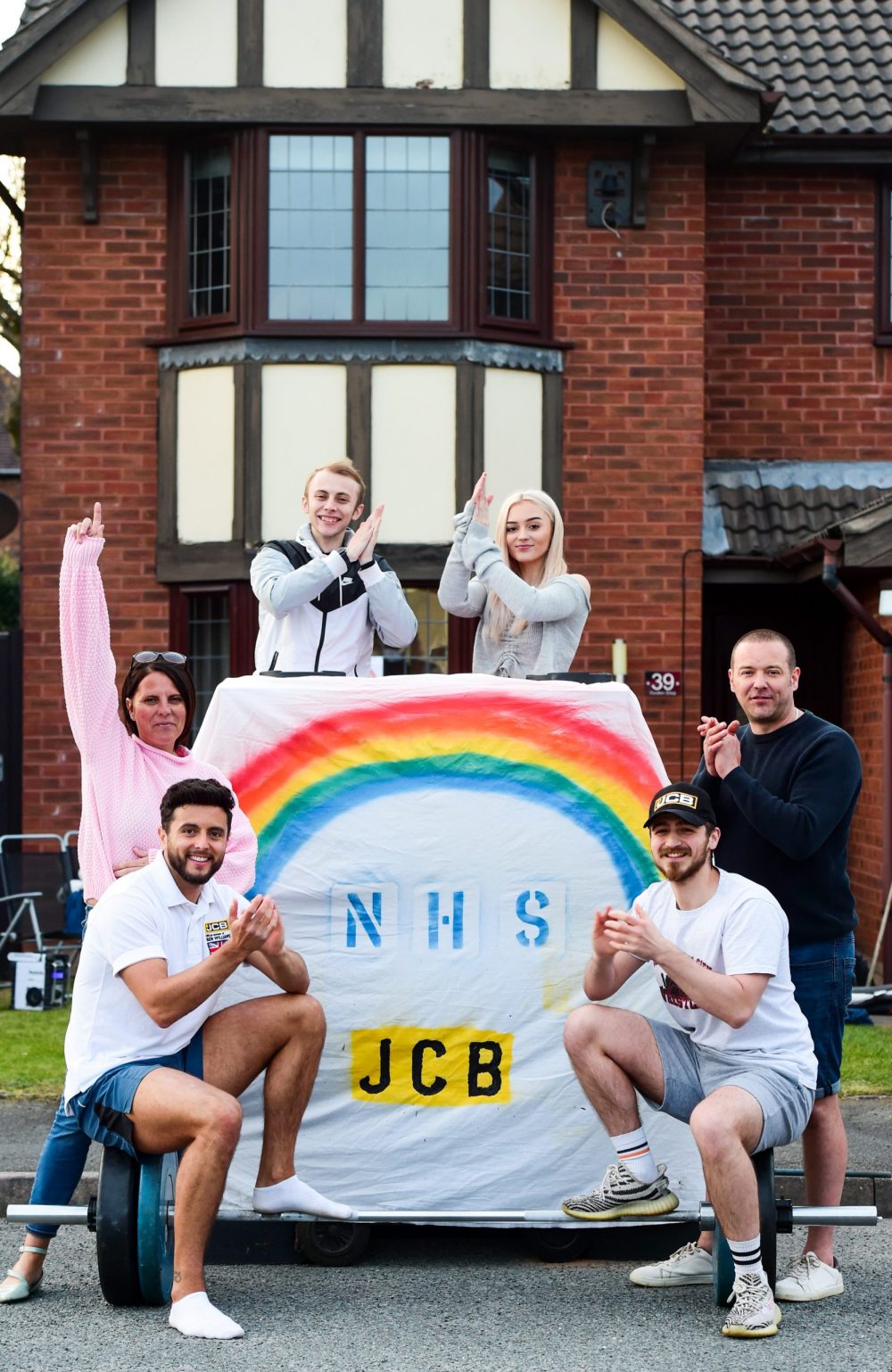 JCB sponsored athletes Ben and Adam smash NHS charity target with marathon effort