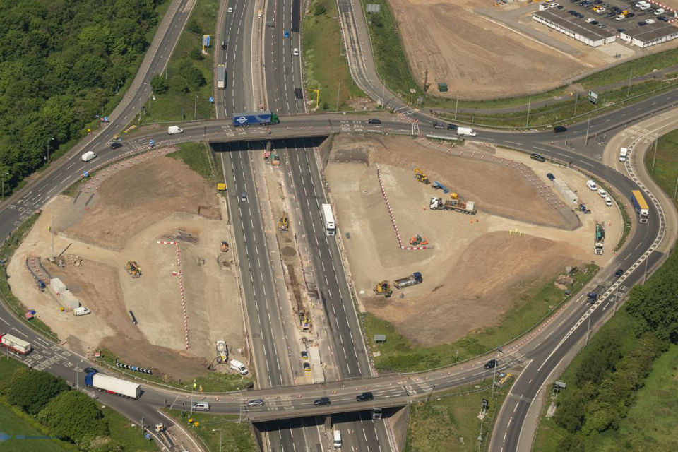 Two aerial close-ups of the centre of the roundabout and M6 carriageways showing verge and central reservation piers taking shape. Photo © Copyright 360photosurvey.com 2020 all rights reserved