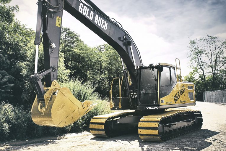 VolvoCE donates $290,000 to two nonprofits from Gold Rush excavator auction