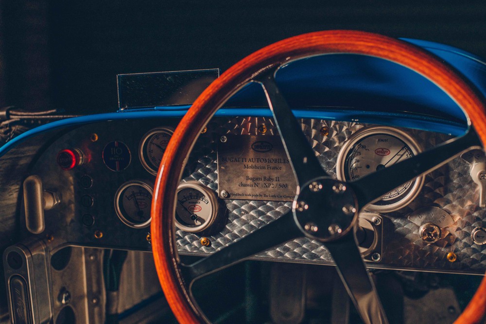 The distinctive four-spoke steering wheel is a scale recreation of that seen on the Type 35