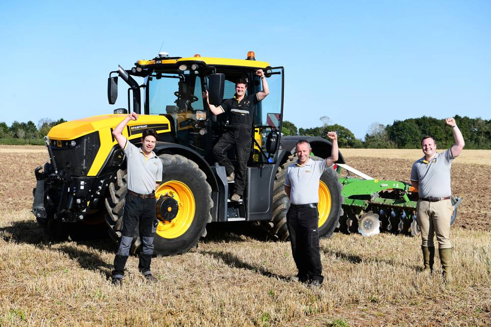 Pictured left to right are Fastrac Sales Engineer Peter Williams, Senior Fastrac Sales Engineer James Coxon, Product and Marketing Manager JCB Agriculture David Timmis and Fastrac Product Specialist Tom Mowforth celebrate the creation of the special 75th anniversary tribute.