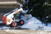 Bobcat get stuck into digging Madrid out of the snow