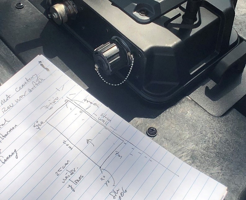 Use a notebook to mark possible targets, obstructions, and possible graves