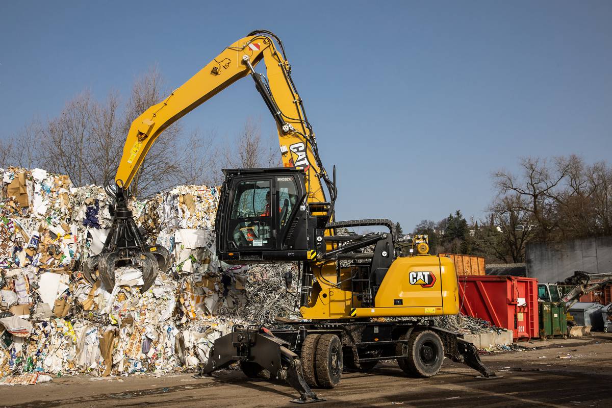 The new Cat MH3022 and MH3024 Material Handlers boost cycle times