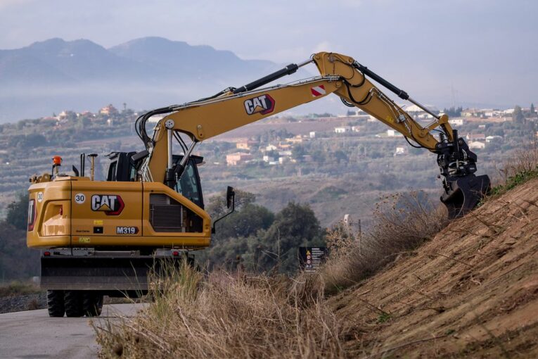Cat's new M319 Wheeled Excavator features a compact front and tail swing design