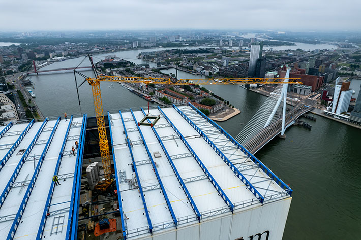 Tallest building in Rotterdam gets a lift from a Liebherr fast-erecting 34K crane