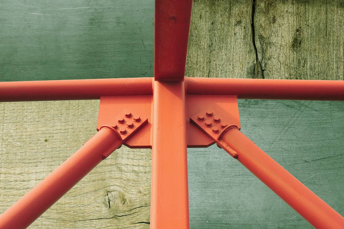 A new analysis by MIT researchers could help architects and builders reduce the carbon footprint of truss structures, the crisscrossing struts that bolster bridges, towers, and buildings. Credits:Image: MIT News, iStockphoto