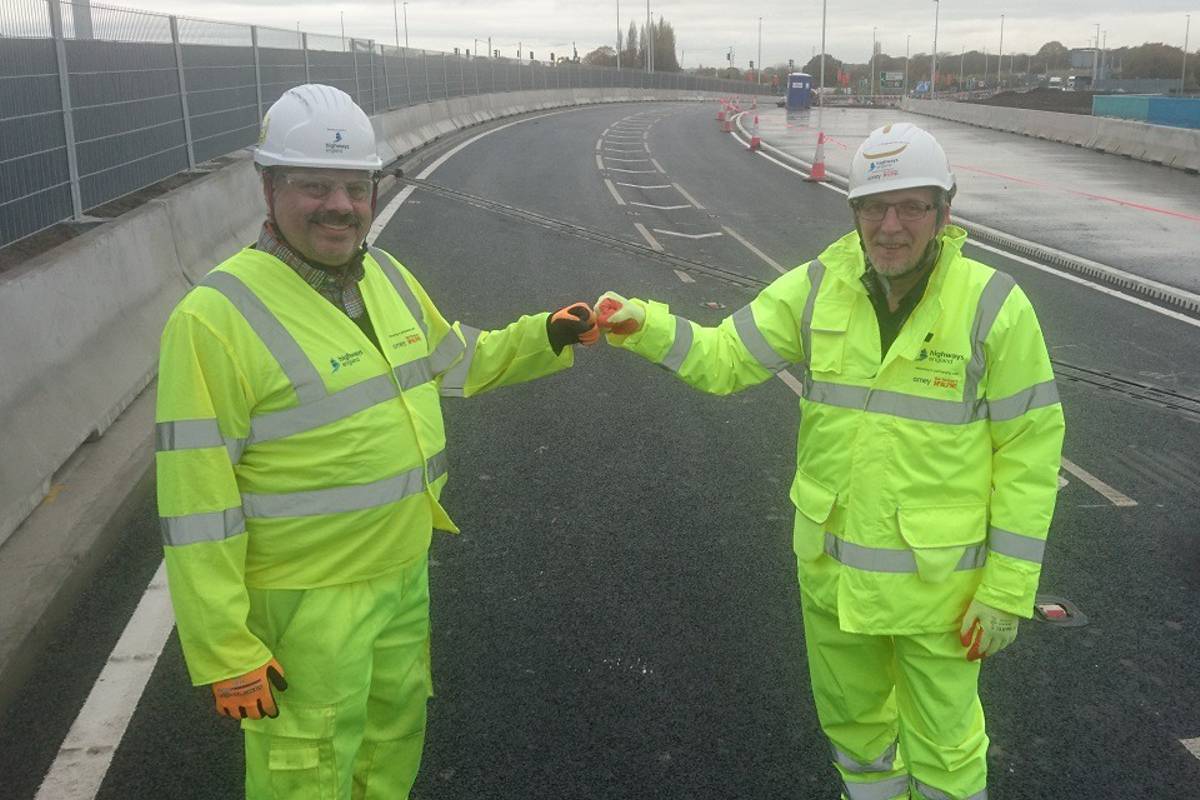 The whole project was delivered during the pandemic and National Highways project manager Khalid El-Rayes (left) and AmeySRM senior project manager Pat Cumming are pictured with a fist-bump celebration of the times on the northbound carriageway of the new bridge just hours before it opened to traffic on Saturday of last week.