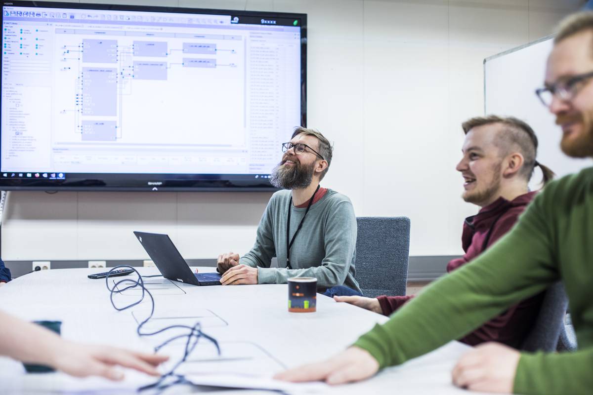The operations of SoC Hub are based on innovation collaboration between Tampere University and businesses. Members of the project team were photographed at Tampere University. Photo: Jonne Renvall/Tampere University