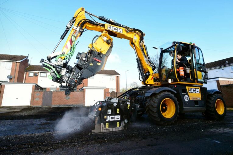 Stoke celebrate Pothole milestone thanks to the JCB Pothole Pro
