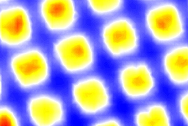 The image of the graphene layers on the photocathode shows areas of low quantum efficiency (in blue) where no electron transmission occurs. The red and yellow areas show increasingly high quantum efficiency. Photoelectrons are emitted and transmitted through the graphene in those areas while overall the material is protected from corrosive gases produced.