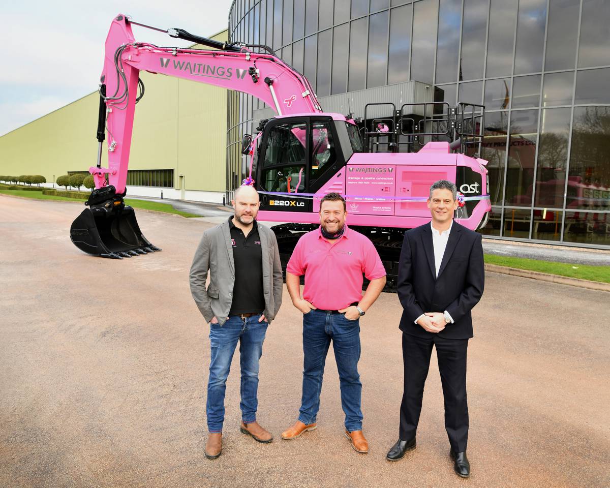 ictured with the new pink JCB X Series tracked excavator are, from left to right, Waitings Directors Robert Waiting and Adrian Ash with JCB UK and Ireland Sales Director, Steve Smith.