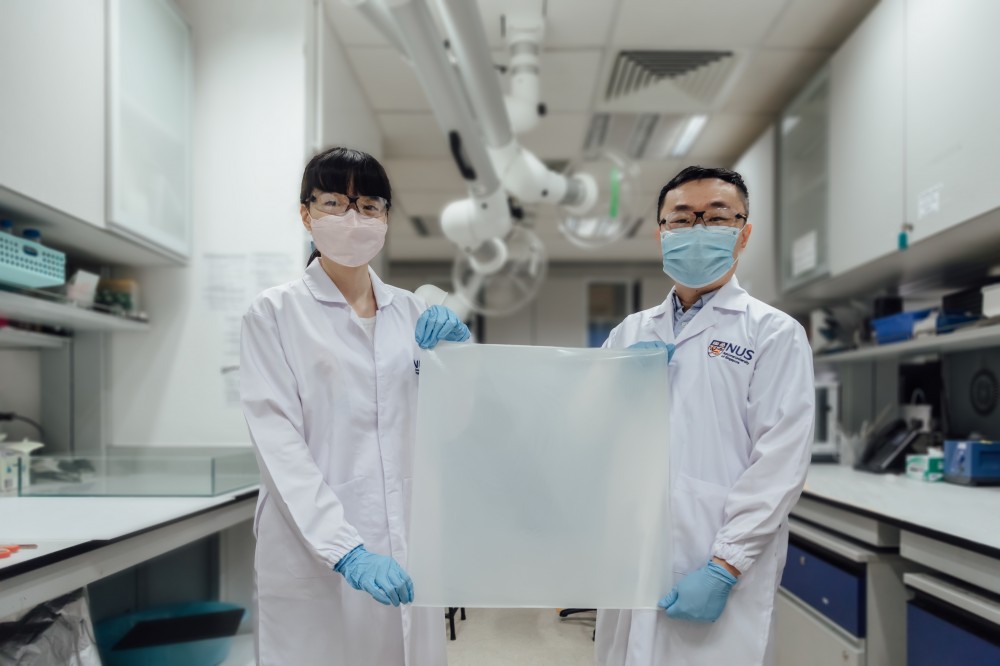 National University of Singapore Developed by researchers from the National University of Singapore, this novel moisture-trapping film has fast absorption rate, high absorption capacity and excellent mechanical properties. It is also affordable, light-weight, easy to fabricate, reusable, biocompatible and non-toxic. Left to right: Ms Yang Jiachen and Asst Prof Tan Swee Ching.