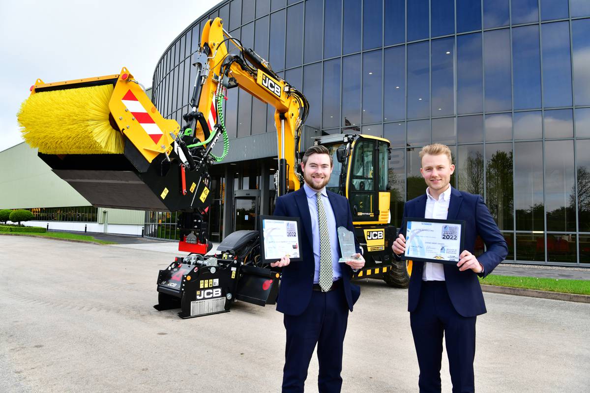 JCB’s Ben Rawding (left) and Daniel Jenner celebrate the JCB Pothole Pro’s double award success.