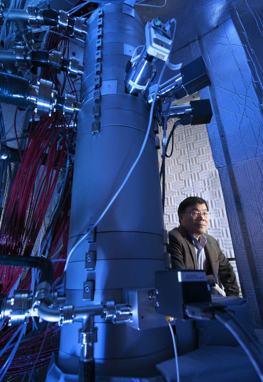 Credit: Steven Zylius / UCI Xiaoqing Pan, UCI professor of materials science and engineering and physics, Henry Samueli Endowed Chair in Engineering, and director of the Irvine Materials Research Institute is seated next to IMRI’s Nion Ultra Scanning Transmission Electron Microscope. The instrument was used to make atomic-scale observations of phonon interactions in crystals, the subject of a new paper in Nature.
