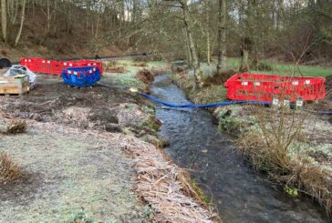 Running a water pipe under a stream with a TRACTO PS60 GRUNDOPIT