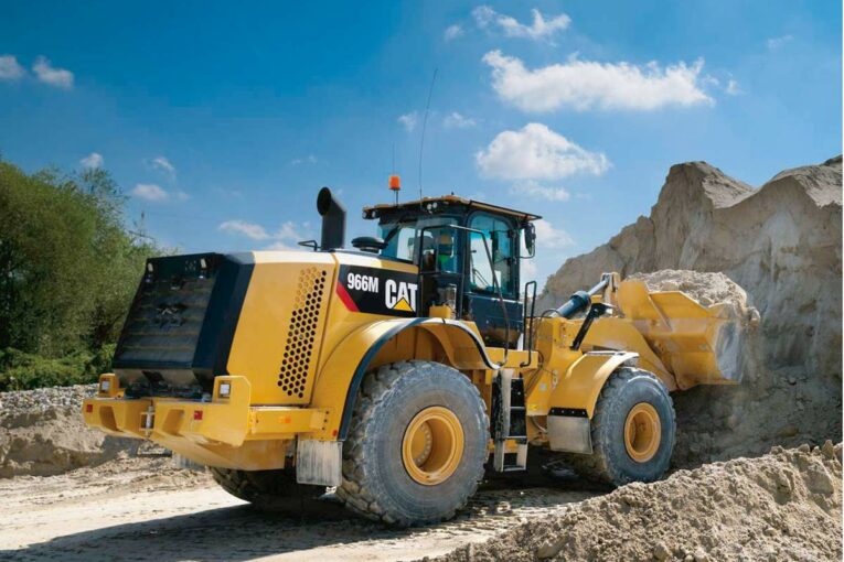 Evolution of the Wheel Loader - From Modified Tractors to Technological Titans