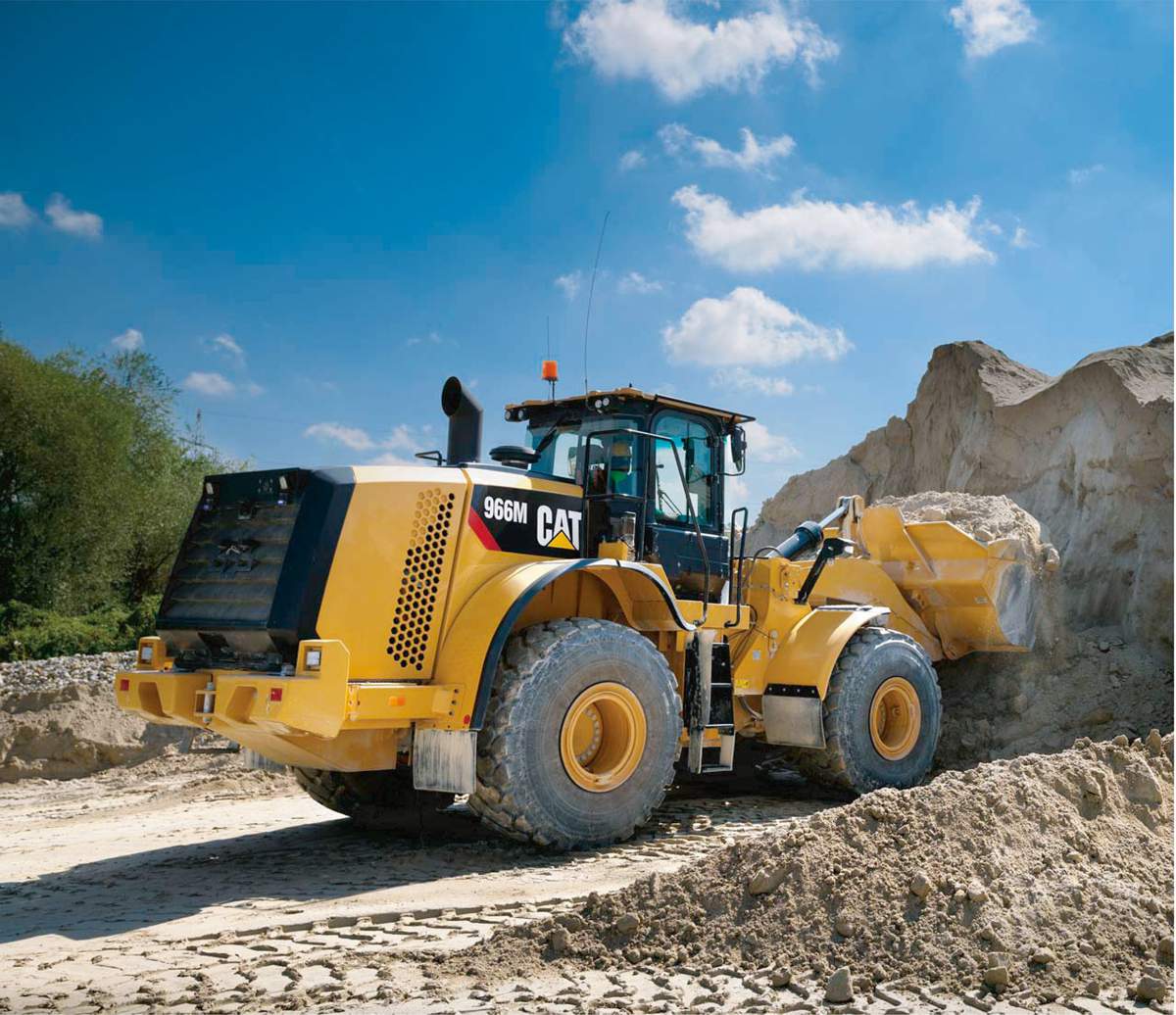 Evolution of the Wheel Loader - From Modified Tractors to Technological Titans
