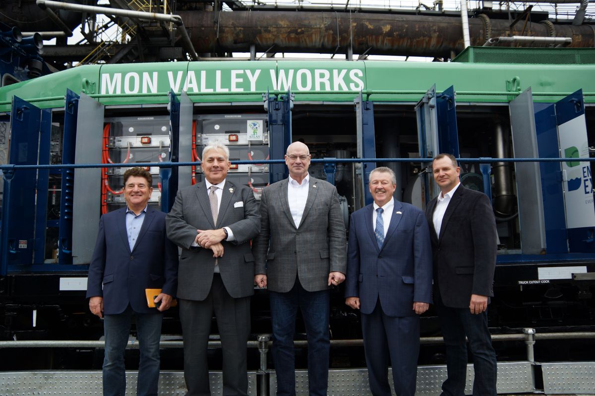 Pictured Left to Right: Ira Dorfman, Principal, Innovative Rail Technologies; Samuel DeMarco III, At Large Council Representative, Allegheny County; David Burritt, President and CEO, U. S. Steel; Pennsylvania State Senator Jim Brewster; and Kurt Barshick, Vice President - U. S. Steel Mon Valley Works with U. S. Steel's new battery-powered locomotive.